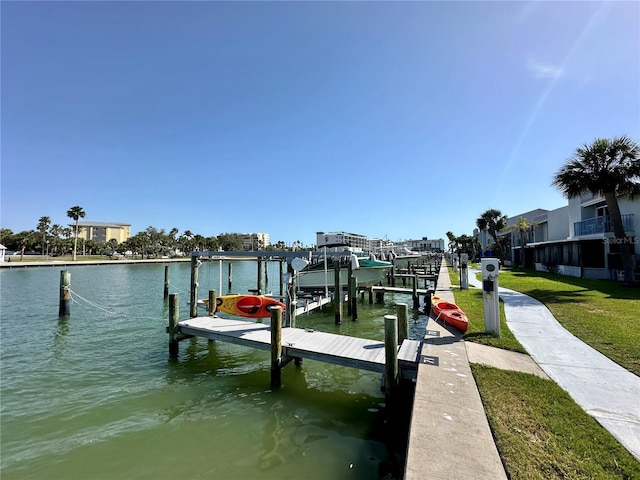 320 Medallion Blvd Unit G, Madeira Beach, FL 33708 - dock with a water view, boat lift, and a yard