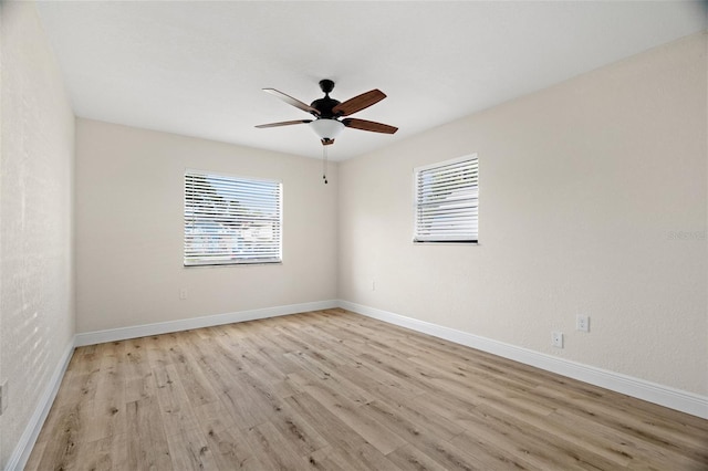 4549 Ontario Dr, New Port Richey, FL 34652 - spare room with light wood-type flooring, ceiling fan, and baseboards