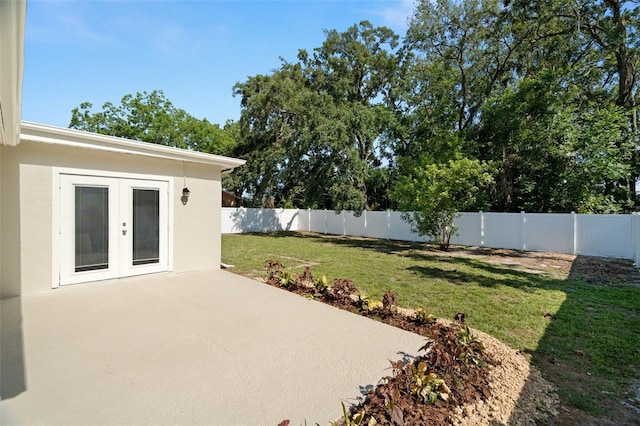 4549 Ontario Dr, New Port Richey, FL 34652 - view of yard with a patio area and french doors
