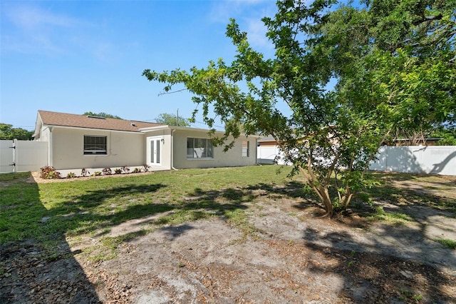 4549 Ontario Dr, New Port Richey, FL 34652 - back of house with stucco siding