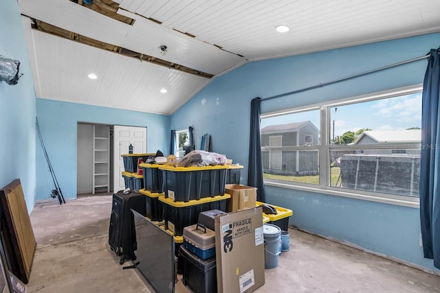 miscellaneous room with concrete flooring, vaulted ceiling, recessed lighting, and wooden ceiling