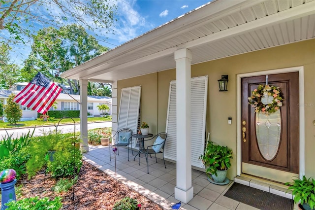 4125 W Obispo St, Tampa, FL 33629 - entrance to property featuring a porch and stucco siding