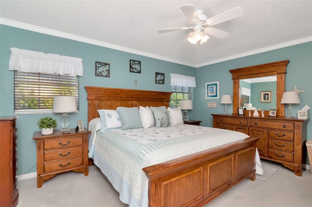 4125 W Obispo St, Tampa, FL 33629 - bedroom featuring light colored carpet, ornamental molding, a textured ceiling, and a ceiling fan