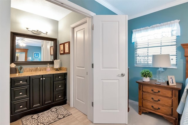 4125 W Obispo St, Tampa, FL 33629 - bathroom with vanity and crown molding