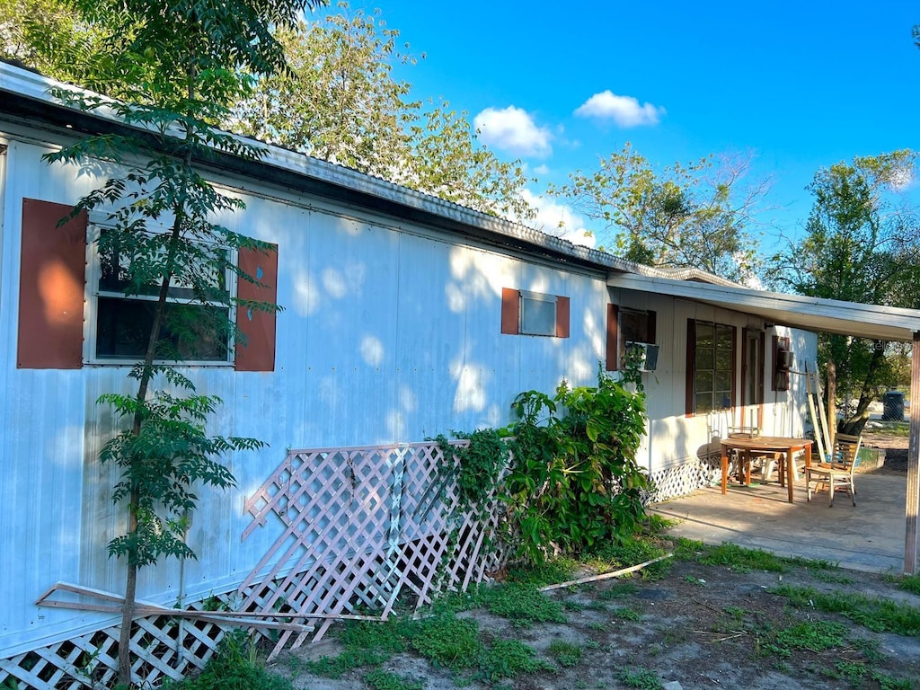 1104 E 122nd Ave, Tampa, FL 33612 - view of rear view of house