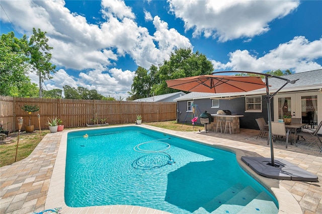 8497 Portulaca Ave, Seminole, FL 33777 - view of swimming pool with a fenced backyard and a patio area