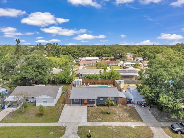 8497 Portulaca Ave, Seminole, FL 33777 - aerial view of residential area with a forest