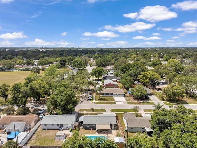 8497 Portulaca Ave, Seminole, FL 33777 - aerial view of residential area with a tree filled landscape