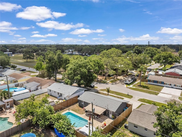 8497 Portulaca Ave, Seminole, FL 33777 - aerial view of residential area featuring a pool area and a tree filled landscape
