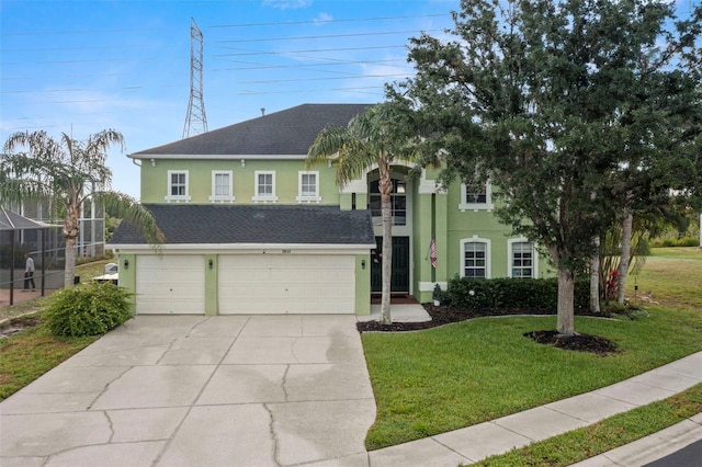 2832 Brinley Dr, New Port Richey, FL 34655 - view of front of house with stucco siding, driveway, a shingled roof, and a front lawn