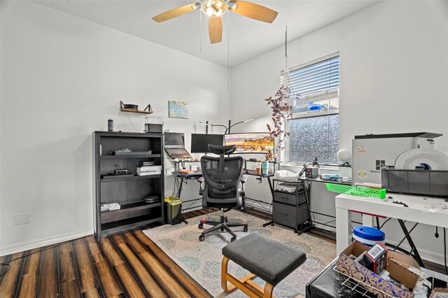 2832 Brinley Dr, New Port Richey, FL 34655 - office area with wood finished floors, ceiling fan, and baseboards