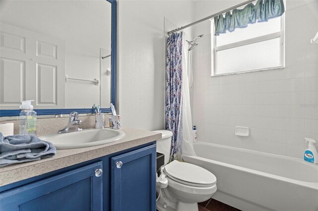 2832 Brinley Dr, New Port Richey, FL 34655 - full bath with toilet, vanity, and shower / bathtub combination with curtain