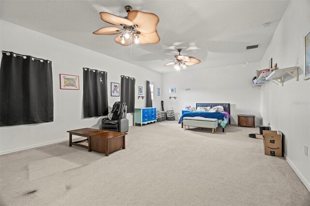 2832 Brinley Dr, New Port Richey, FL 34655 - bedroom with carpet floors, a ceiling fan, and baseboards