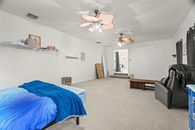 2832 Brinley Dr, New Port Richey, FL 34655 - bedroom with light carpet, a ceiling fan, and baseboards