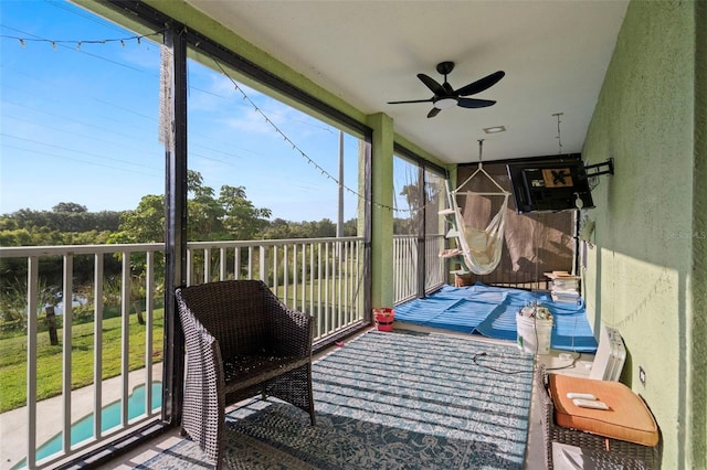 2832 Brinley Dr, New Port Richey, FL 34655 - sunroom / solarium with a ceiling fan
