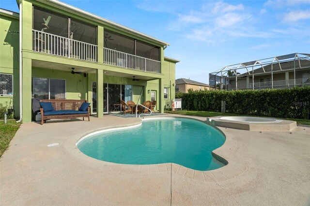 2832 Brinley Dr, New Port Richey, FL 34655 - view of pool with ceiling fan, a patio, a sunroom, and a pool with connected hot tub