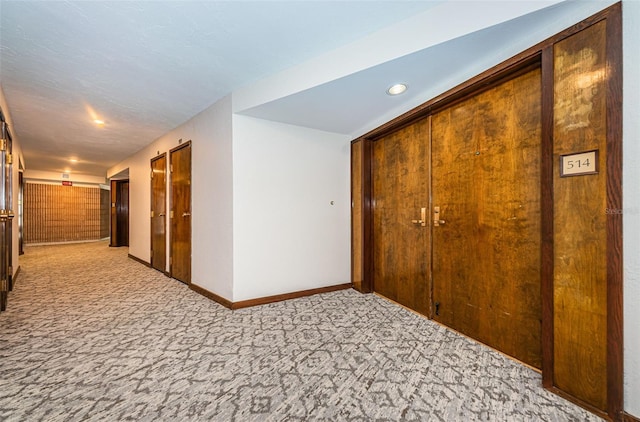 1600 Gulf Blvd Unit 514, Clearwater Beach, FL 33767 - hallway with carpet floors, baseboards, and recessed lighting