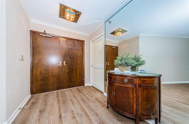 1600 Gulf Blvd Unit 514, Clearwater Beach, FL 33767 - entryway with wood finished floors, baseboards, and ornamental molding