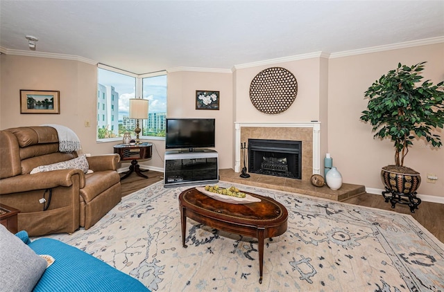 1600 Gulf Blvd Unit 514, Clearwater Beach, FL 33767 - living room featuring wood finished floors, baseboards, crown molding, and a fireplace