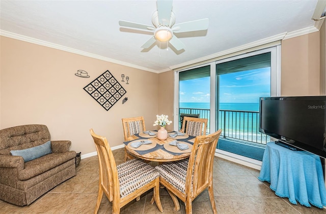1600 Gulf Blvd Unit 514, Clearwater Beach, FL 33767 - tiled dining space with crown molding, ceiling fan, and baseboards