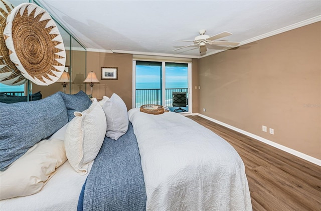 1600 Gulf Blvd Unit 514, Clearwater Beach, FL 33767 - bedroom with access to exterior, wood finished floors, baseboards, crown molding, and a ceiling fan