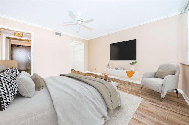1600 Gulf Blvd Unit 514, Clearwater Beach, FL 33767 - bedroom with wood finished floors, ornamental molding, baseboards, and a ceiling fan