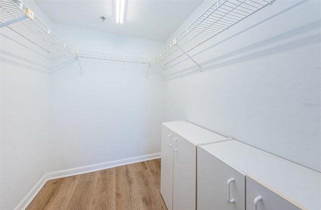 1600 Gulf Blvd Unit 514, Clearwater Beach, FL 33767 - walk in closet with light wood-style floors