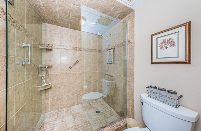 1600 Gulf Blvd Unit 514, Clearwater Beach, FL 33767 - bathroom featuring toilet and a stall shower