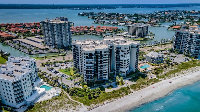 1600 Gulf Blvd Unit 514, Clearwater Beach, FL 33767 - drone / aerial view of a large body of water, apartment complex / building, and a pool