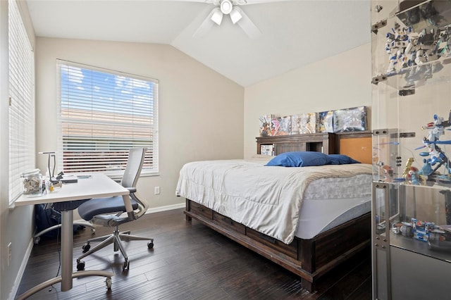 bedroom featuring baseboards, dark wood-style flooring, lofted ceiling, a desk, and ceiling fan