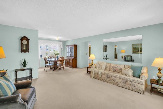 2113 Malcolm Dr, Palm Harbor, FL 34684 - living area with carpet and a textured ceiling