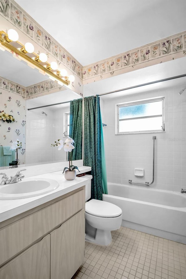 2113 Malcolm Dr, Palm Harbor, FL 34684 - full bathroom with toilet, shower / bathtub combination with curtain, tile patterned floors, wallpapered walls, and vanity