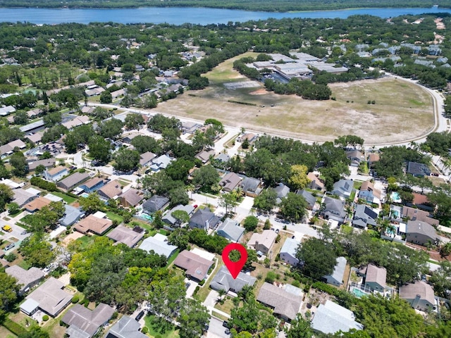 2113 Malcolm Dr, Palm Harbor, FL 34684 - aerial overview of property's location with a large body of water and nearby suburban area