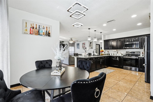 4422 Evergreen Forest Loop, Kissimmee, FL 34758 - dining room featuring recessed lighting, light tile patterned floors, and a ceiling fan