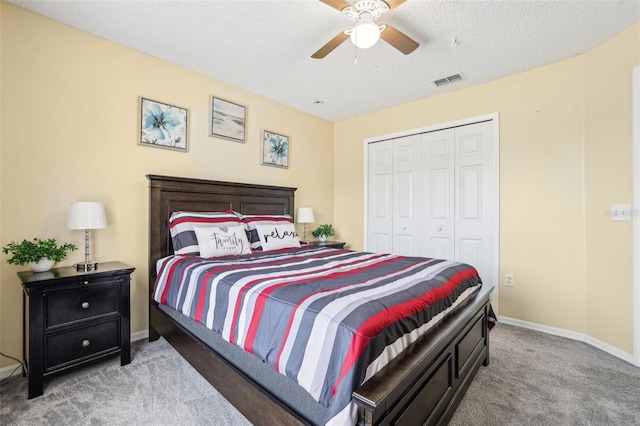 4422 Evergreen Forest Loop, Kissimmee, FL 34758 - carpeted bedroom with a closet, baseboards, ceiling fan, and a textured ceiling