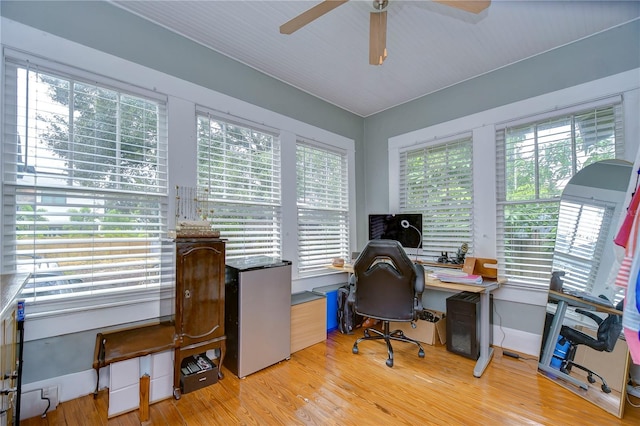 902 W Columbus Dr, Tampa, FL 33602 - office area featuring a ceiling fan, healthy amount of natural light, wood finished floors, and baseboards