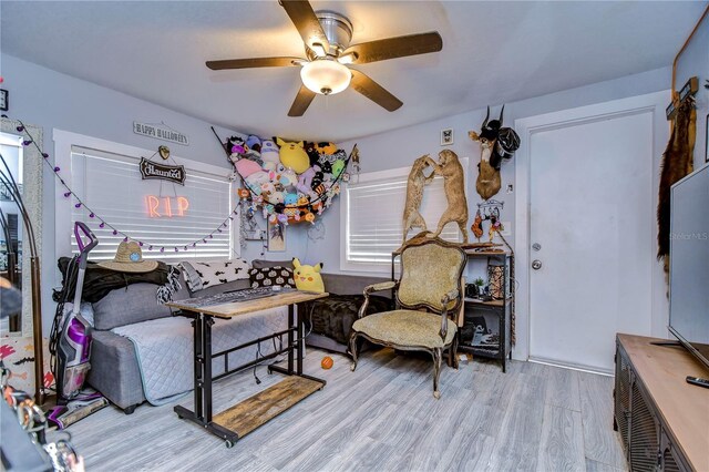 902 W Columbus Dr, Tampa, FL 33602 - living area with ceiling fan and wood finished floors