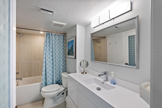 700 Beach Dr NE Unit 704, Saint Petersburg, FL 33701 - full bathroom featuring toilet, a textured ceiling, shower / bathtub combination with curtain, and vanity