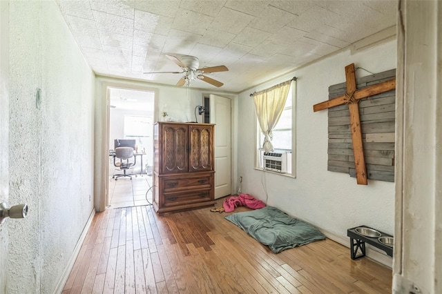 797 Hwy Unit 196, Cantonment, FL 32533 - entryway featuring a textured wall, plenty of natural light, hardwood / wood-style flooring, and ceiling fan