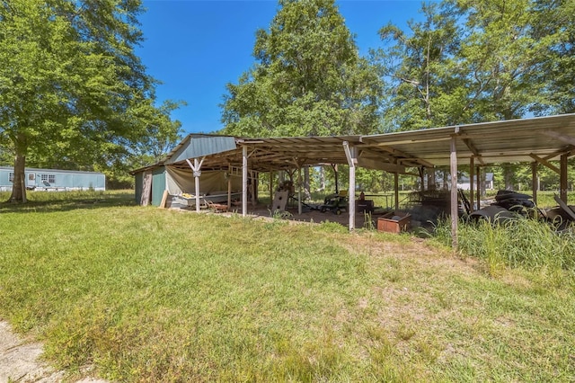 797 Hwy Unit 196, Cantonment, FL 32533 - view of green lawn featuring an outbuilding