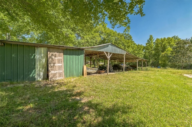 797 Hwy Unit 196, Cantonment, FL 32533 - view of grassy yard with an outbuilding