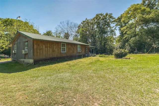 797 Hwy Unit 196, Cantonment, FL 32533 - view of side of property featuring a yard and metal roof
