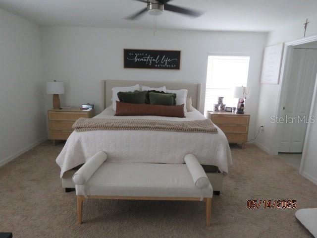 206 Samantha Ave, Auburndale, FL 33823 - bedroom featuring light carpet, ceiling fan, and baseboards