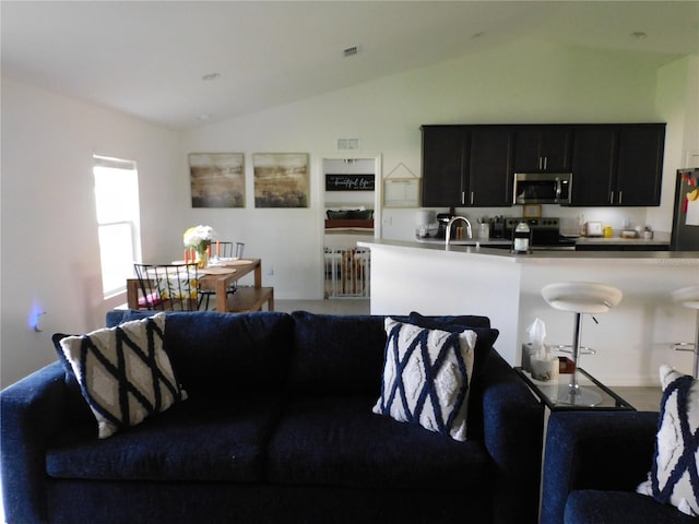 206 Samantha Ave, Auburndale, FL 33823 - living area featuring vaulted ceiling