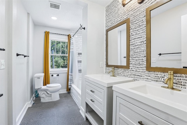 5632 Indiana Ave, New Port Richey, FL 34652 - bathroom with toilet, shower / bath combo, baseboards, and vanity