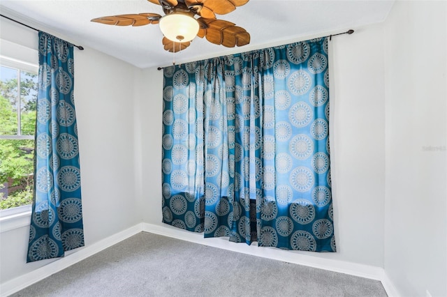 5632 Indiana Ave, New Port Richey, FL 34652 - carpeted empty room with baseboards and a ceiling fan