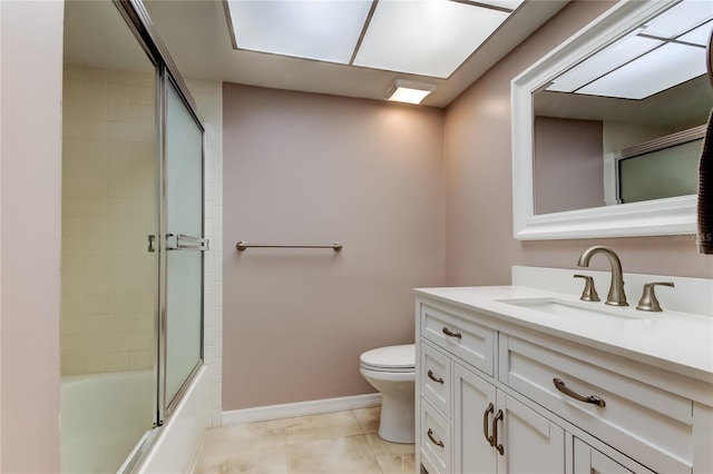 2380 Shelly Dr Unit B, Palm Harbor, FL 34684 - full bath with toilet, vanity, baseboards, and combined bath / shower with glass door