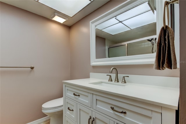 2380 Shelly Dr Unit B, Palm Harbor, FL 34684 - full bath featuring vanity, toilet, a shower with door, and baseboards