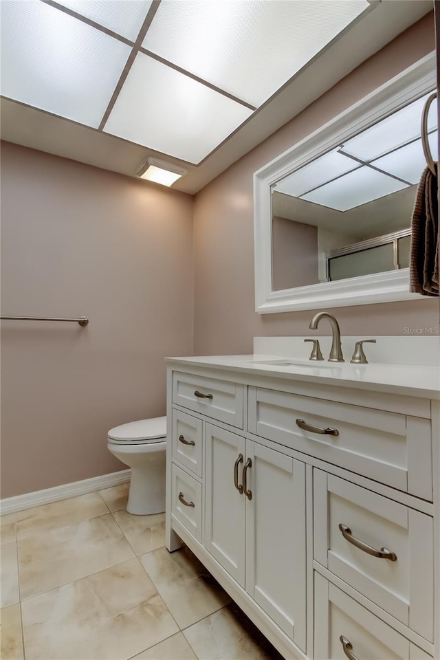 2380 Shelly Dr Unit B, Palm Harbor, FL 34684 - bathroom featuring toilet, vanity, and marble finish floors