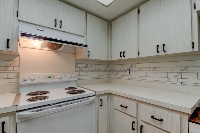 2380 Shelly Dr Unit B, Palm Harbor, FL 34684 - kitchen with white electric range oven, under cabinet range hood, and light countertops